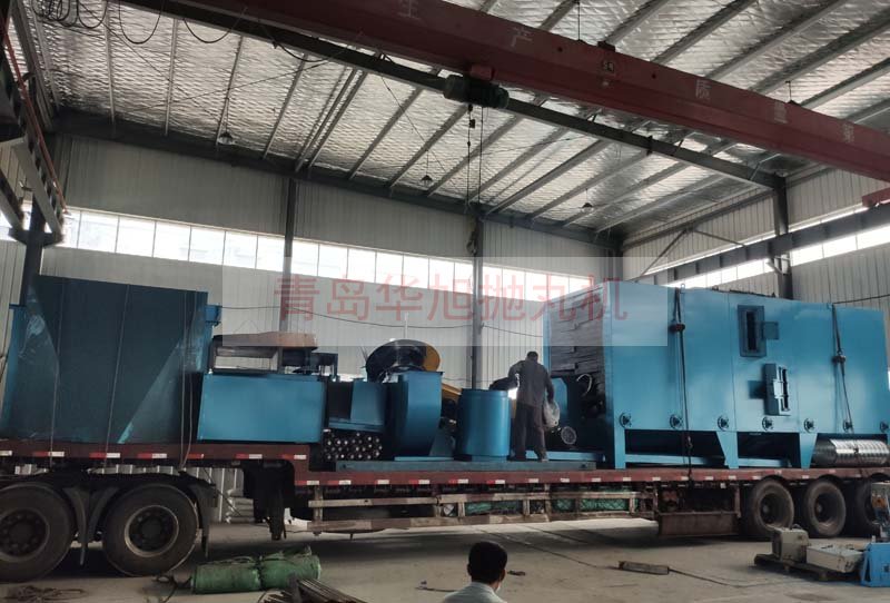 Q6912輥道通過式拋丸機(jī)裝車完畢準(zhǔn)備發(fā)往廣東